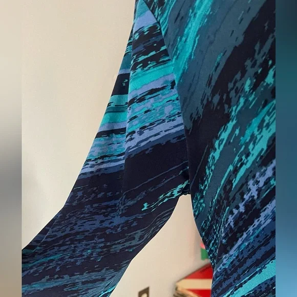 Vintage and Gorgeous- The Bluish colors in this dress are vibrant and Noticeable - Picture 4 of 13